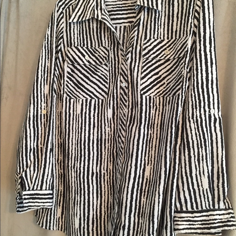 Long sleeve button up shirt or can be worn open
