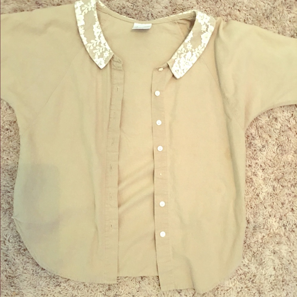 A brown button up shirt