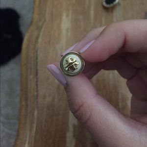 Tory Burch pearl earrings.