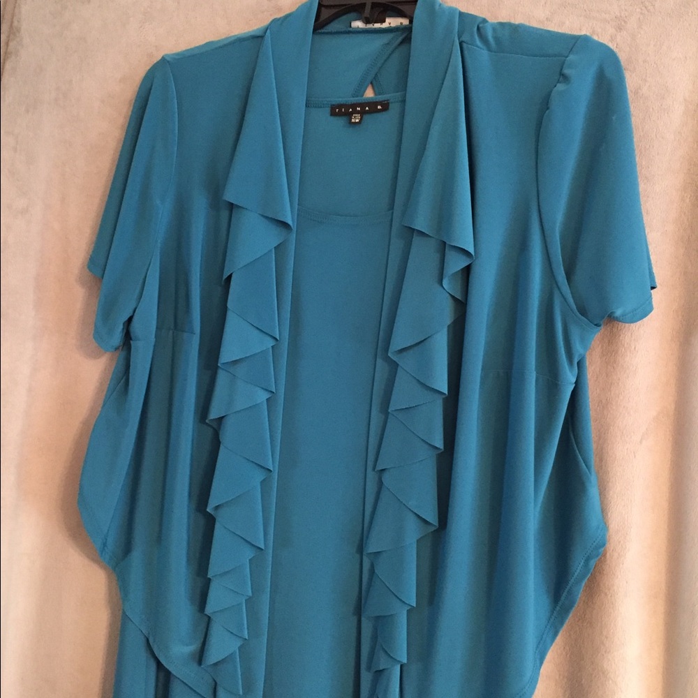 Pretty turquoise dress with jacket. Worn once