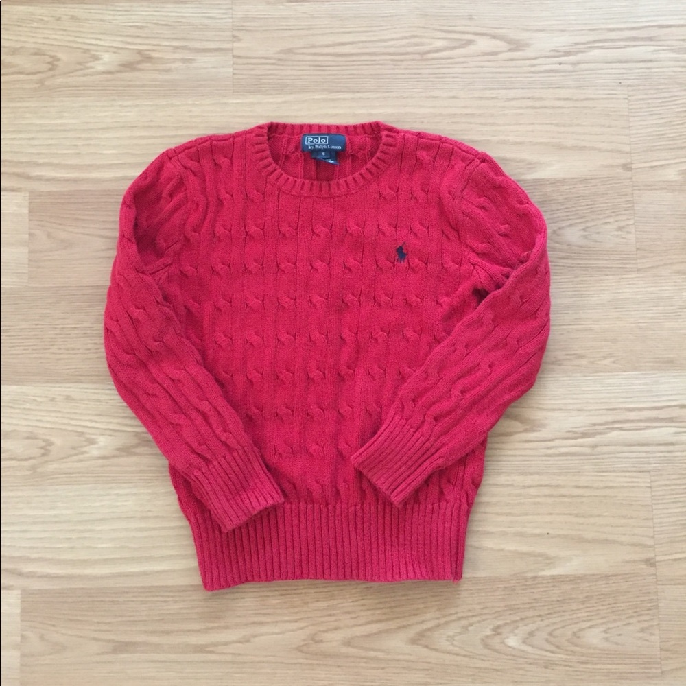Little boys' red cable knit sweater.