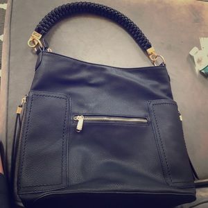 Very cute black Madison West purse!