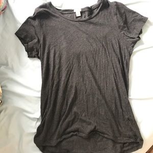 Dark grey short sleeved shirt.