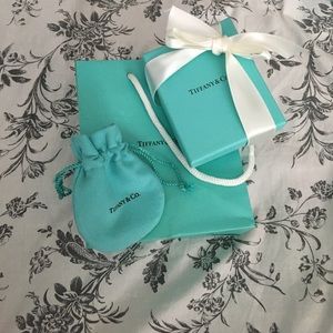 Tiffany & Co. pouch, box w/ ribbon, and bag