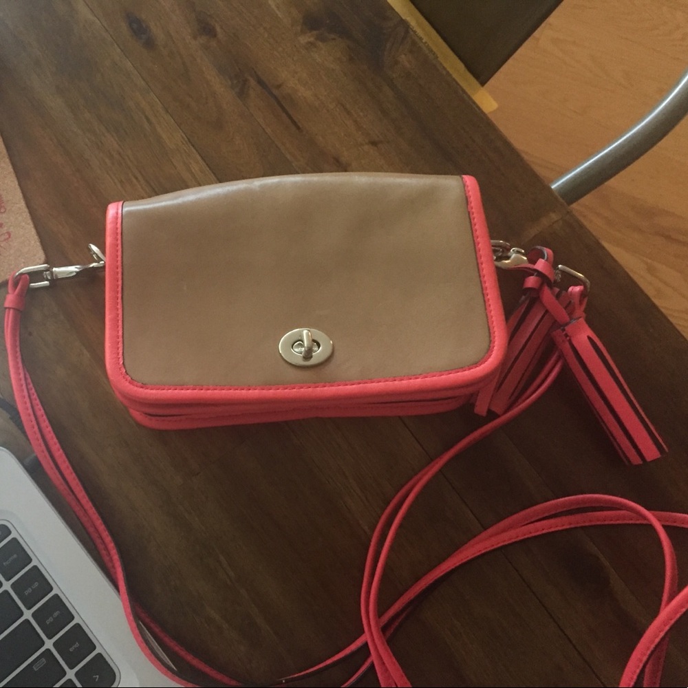 Coach tan and colored shoulder bag.