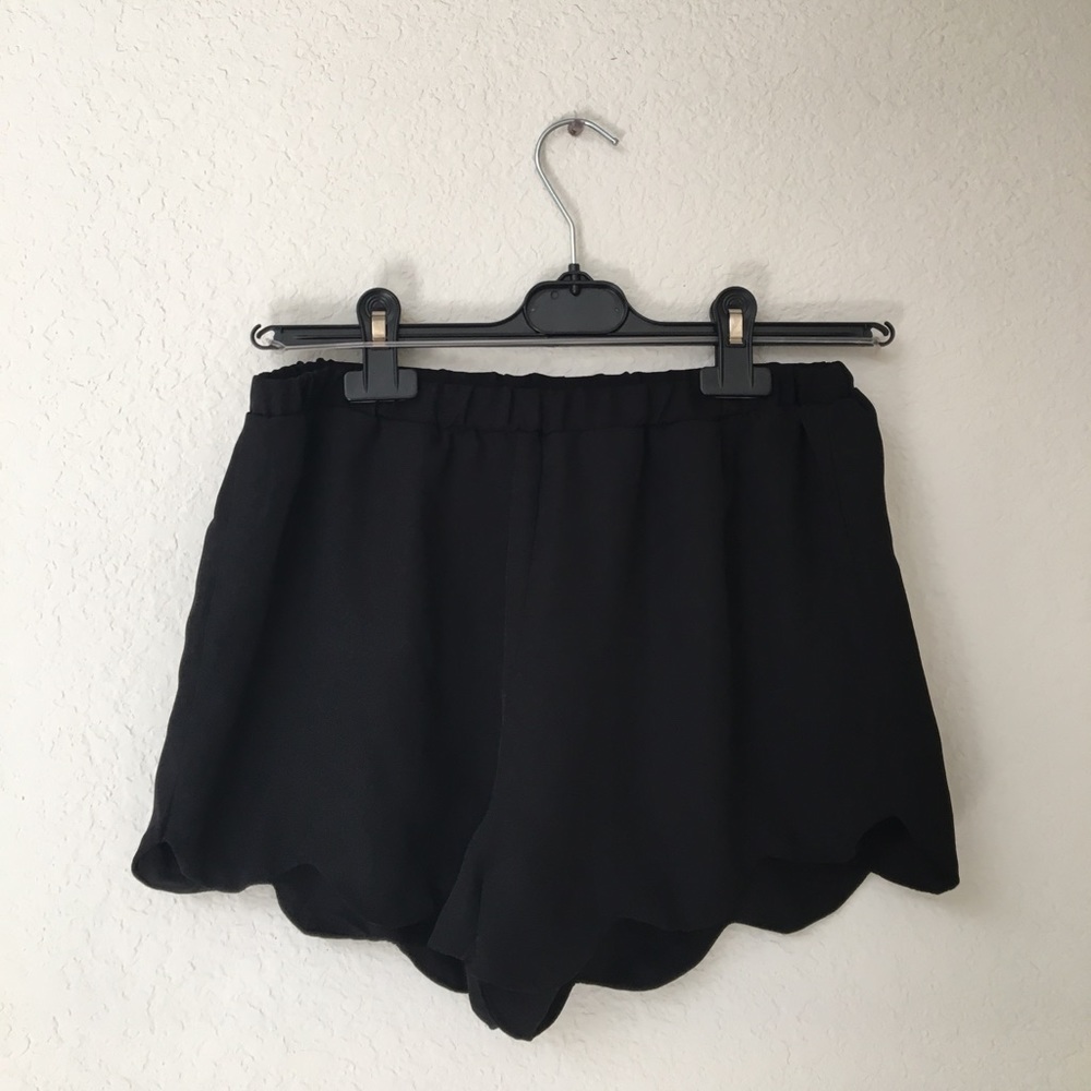 black scalloped flowy shorts