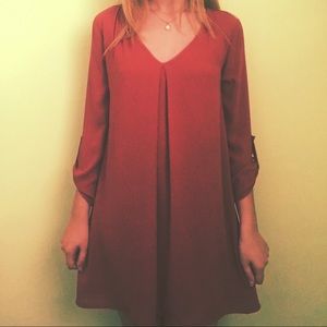 coral long-sleeve button-cuffed dress