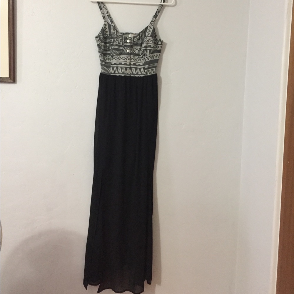 Dress with tribal print top and black bottom.