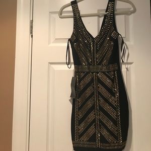 Brand new Bebe dress with tags