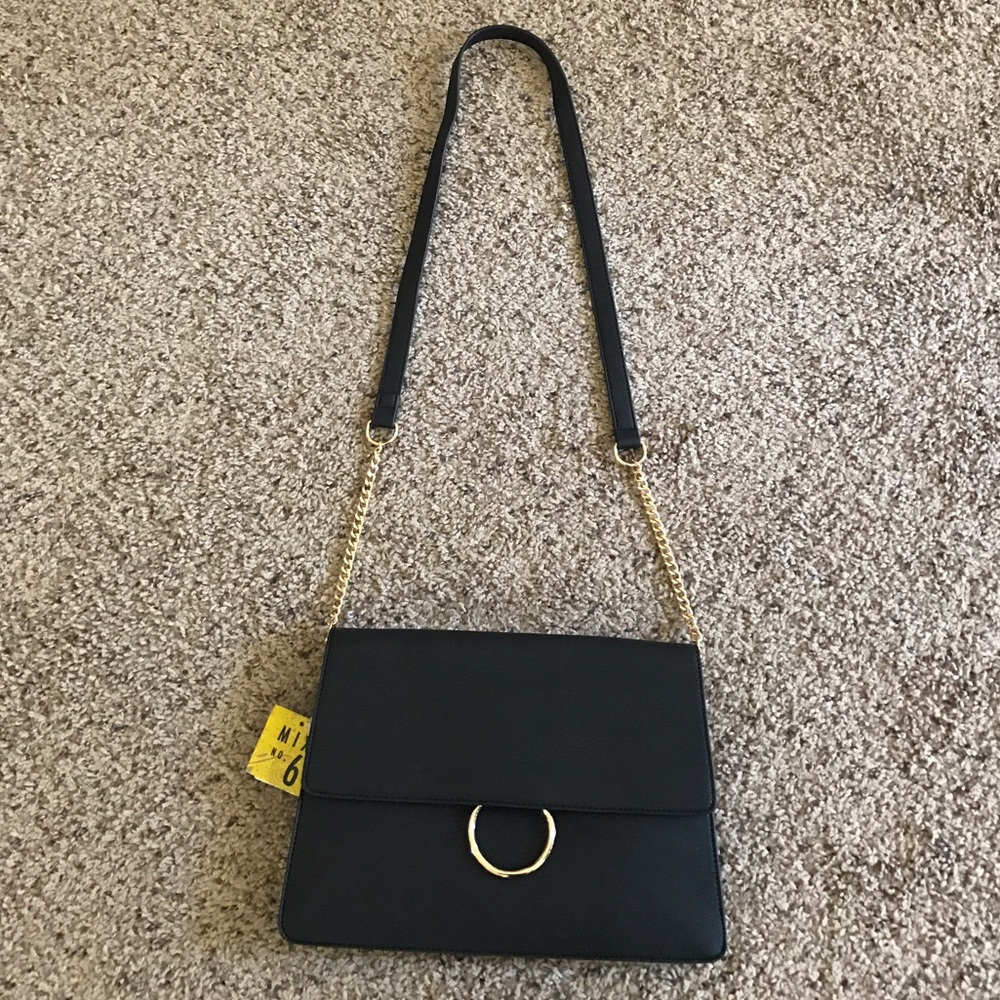 🎉HP🎉 Black & Gold Ring Crossbody Bag