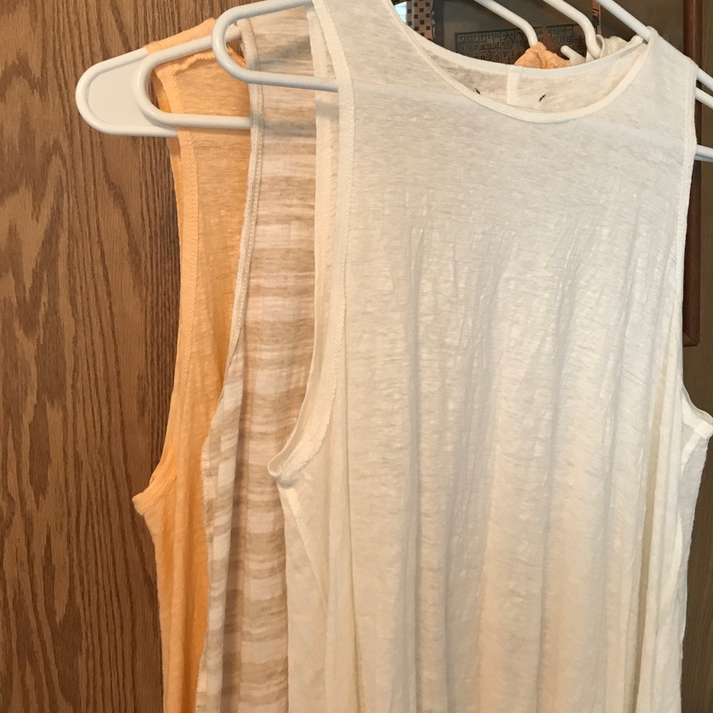 3 muscle tank tops never worn