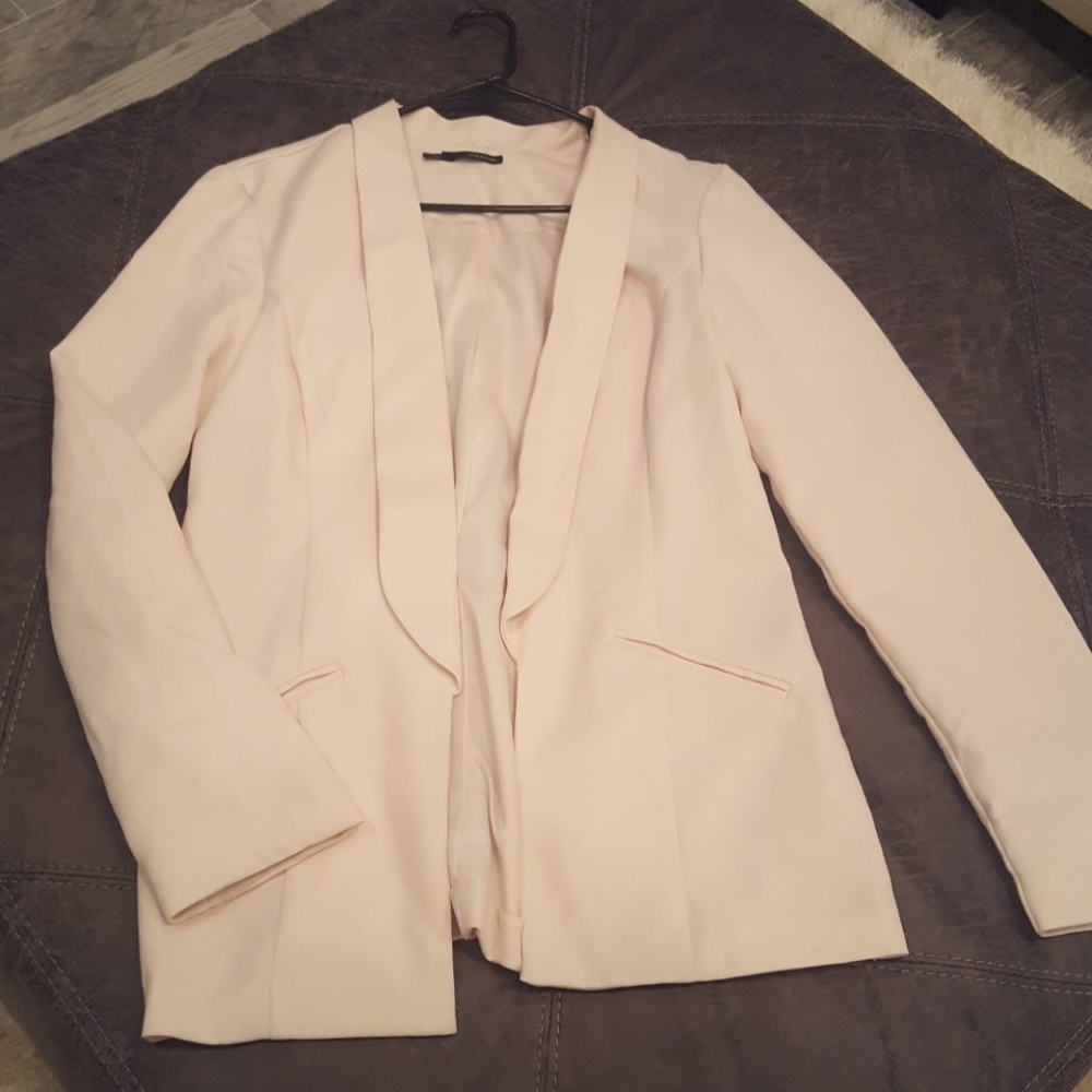Cream colored blazer perfect for work light weight