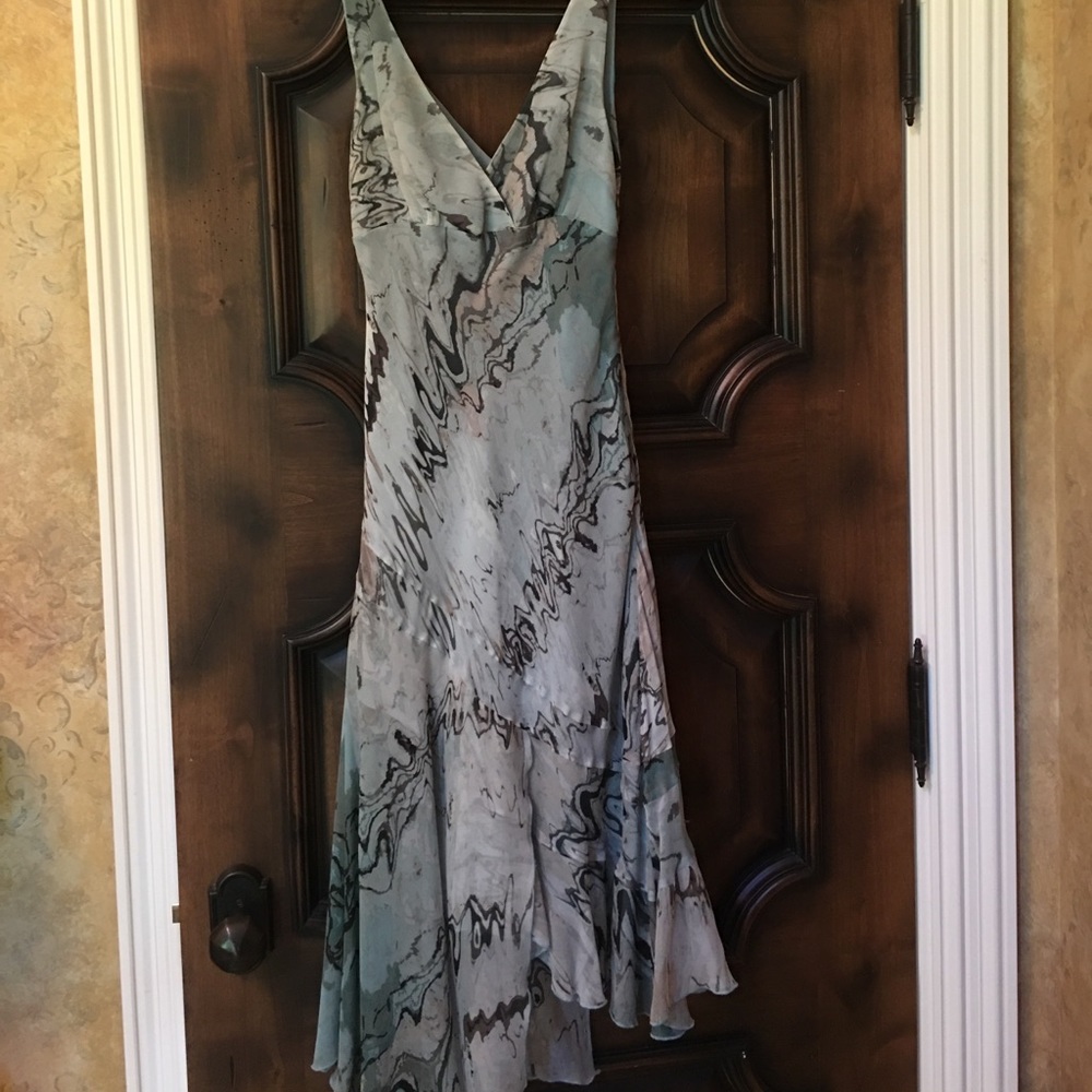 Flows, light, asymmetrical hem dress.