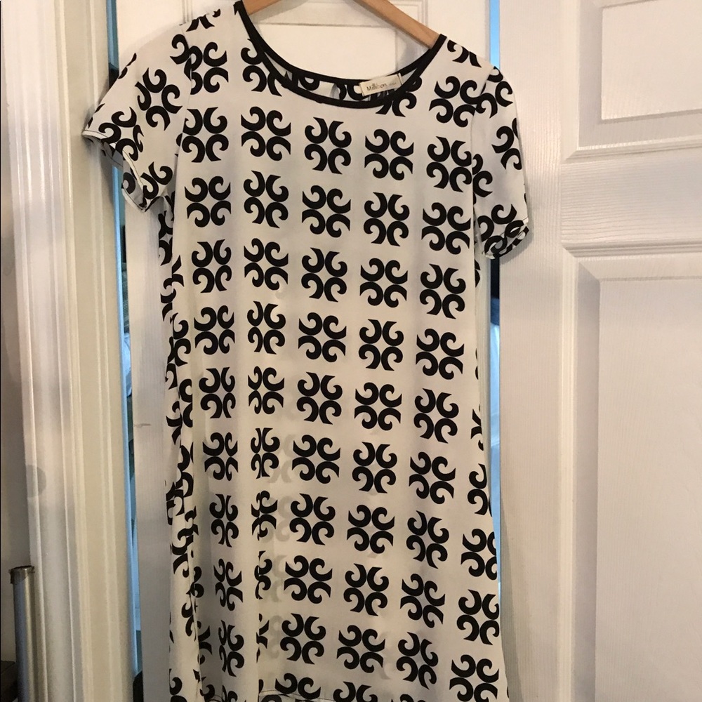 Beautiful new with tags dress .
