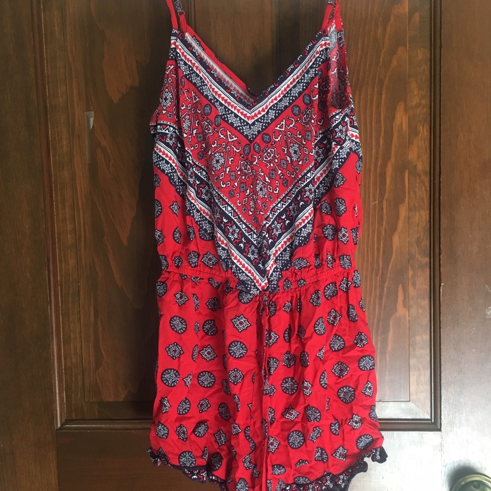 Red and navy patterned romper
