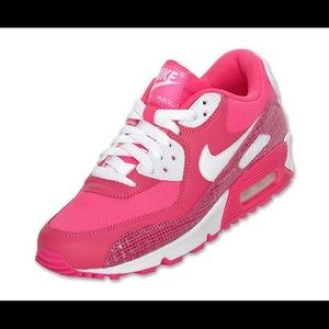 Pink and white Nike air max