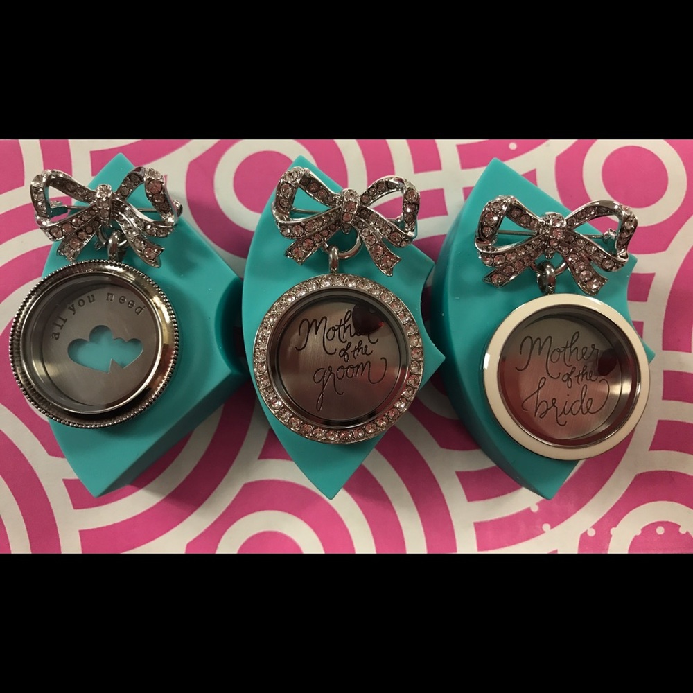 Three origami owl bowpin lockets!
