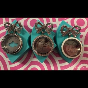 Three origami owl bowpin lockets!