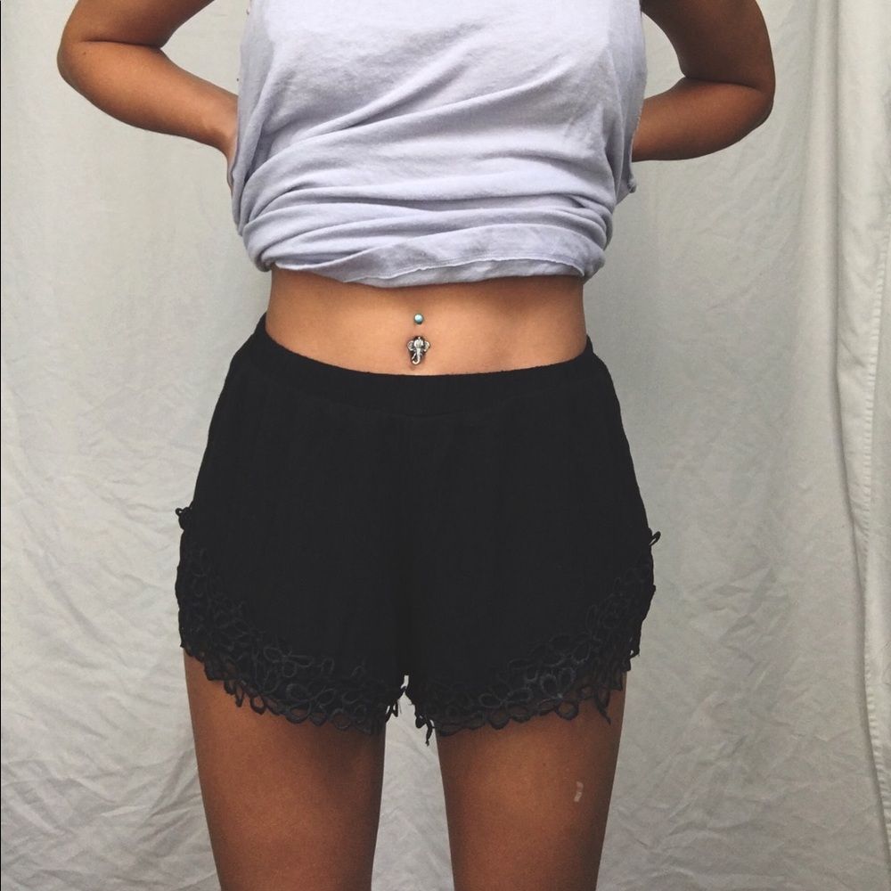 black shorts with flower cutout details