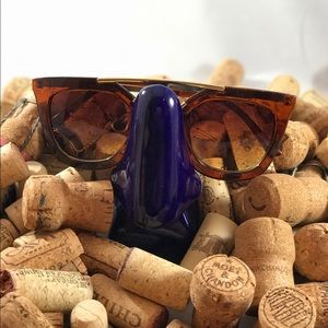 New Devil wears P. (light brown) sunglasses