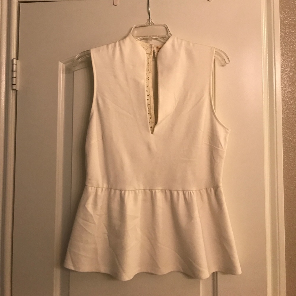 Cute Tank top. Never worn before. Low V