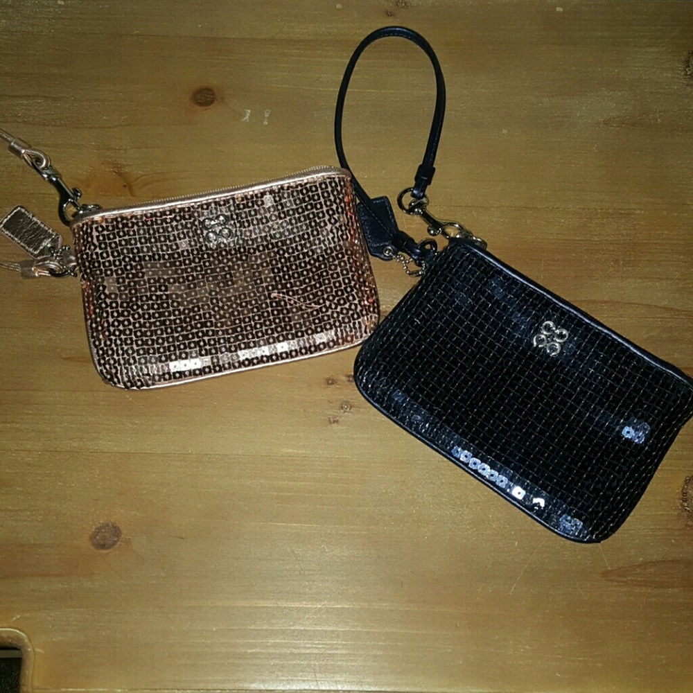 Two Coach wristlet