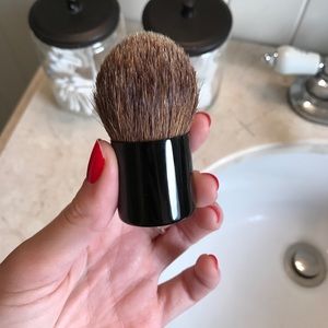 Chanel powder brush.