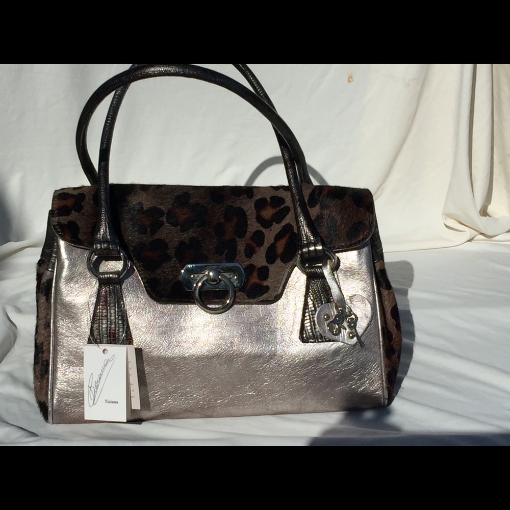 Italian Made leather handbag. Lesther and cowhide