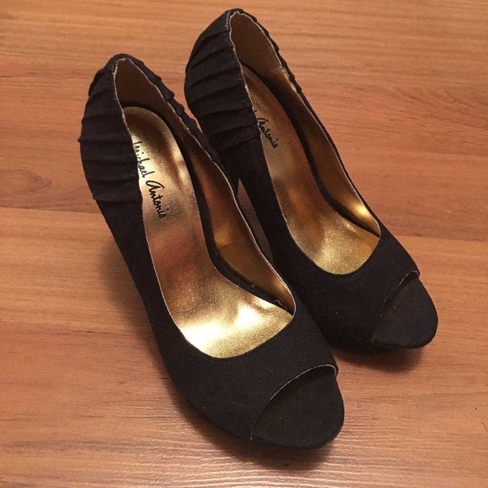 Black suede pumps