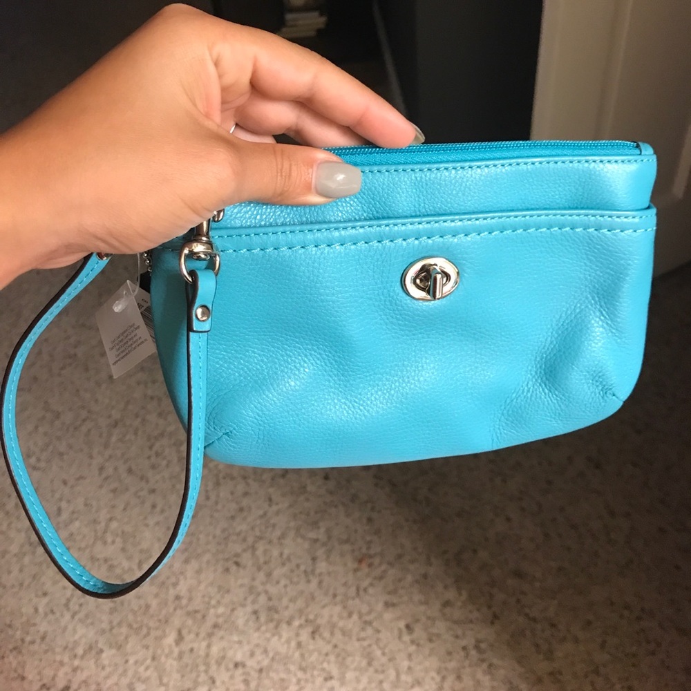 100% Authentic Coach Wristlet/ handbag
