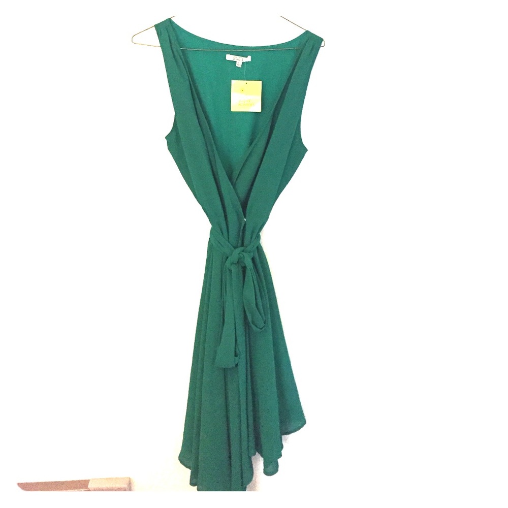 Emerald green wrap dress with flowing Skirt