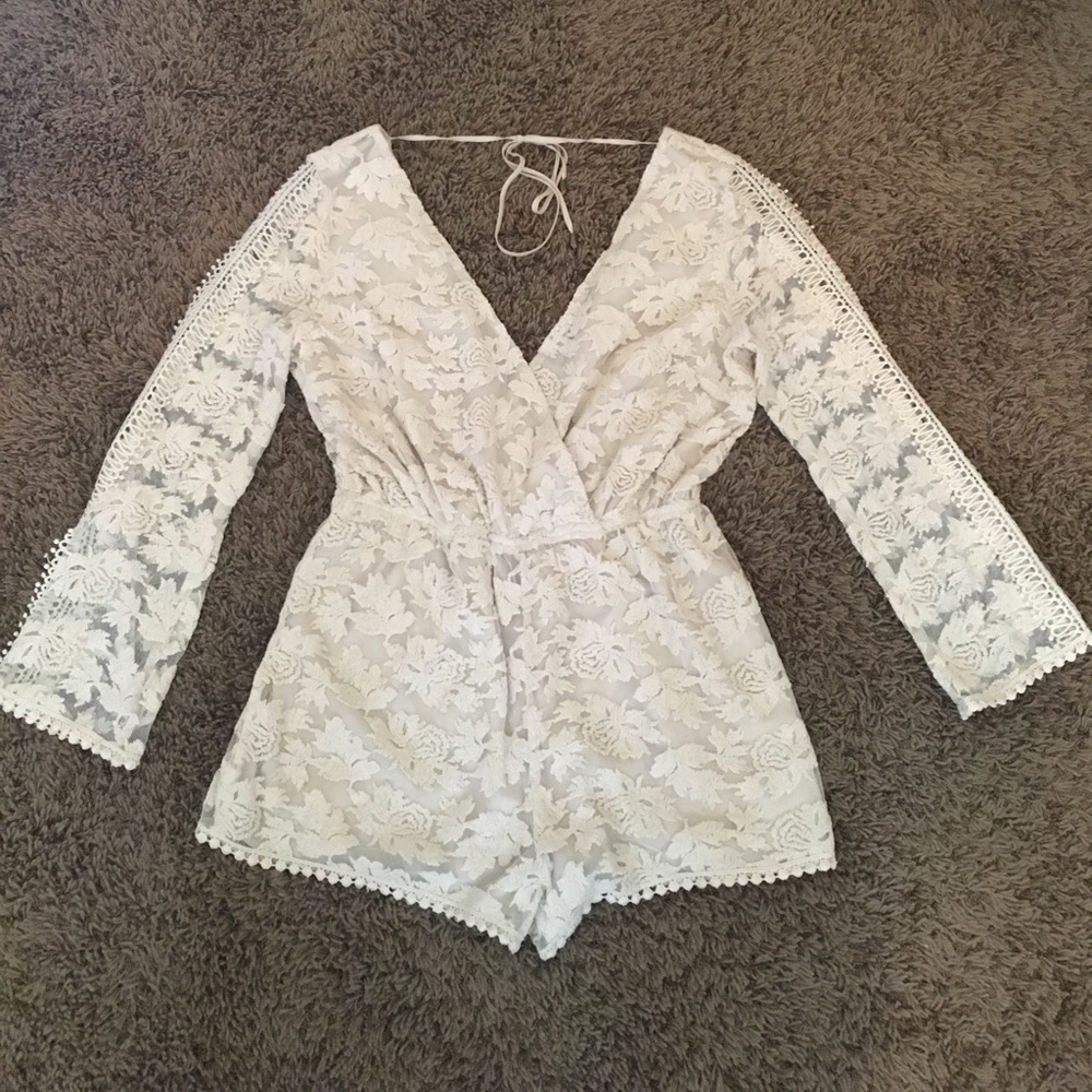 Adelyn Rae long-sleeved romper. NWT!