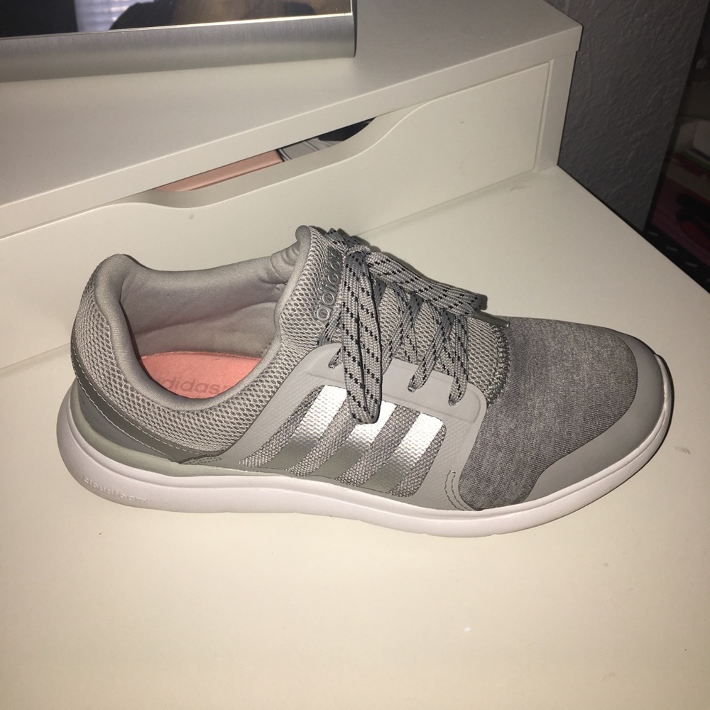 Gray and white slip on adidas