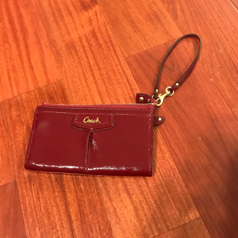 Coach wristlet shiny maroon Never Been Used!