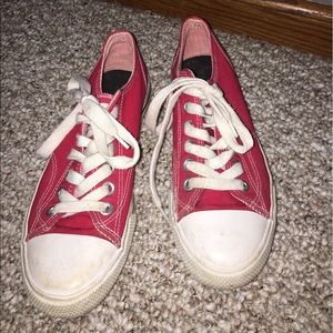 Red tennis shoes, similar to converse