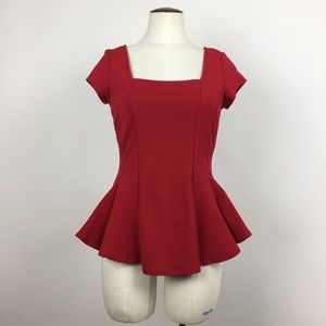Red peplum top with square neckline