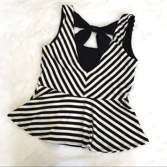 Shop by category Black and white striped peplum top with camel pants look courage and unusually Red peplum top with faded denim capri pants: it is perfect image for a romantic date White peplum top .