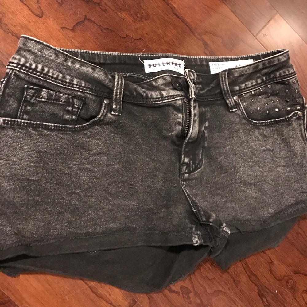 Black denim studded shorts