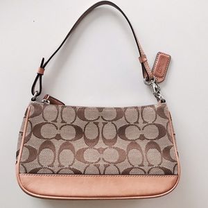 Coach purse with classic embroidery