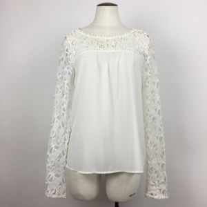 White blouse with beautiful lace sleeves