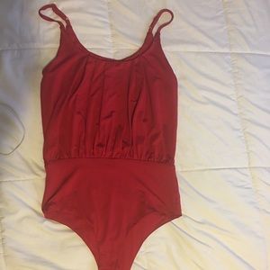 Red body suit