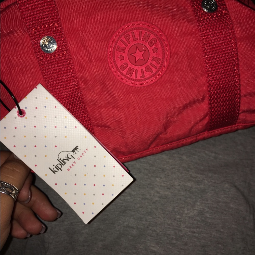 Red Kipling Crossbody Never Used,Got as grad gift.