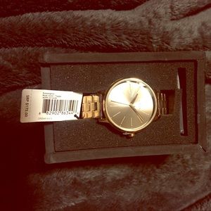 Rose gold Nixon watch