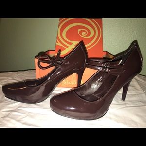 Brown patent leather pumps