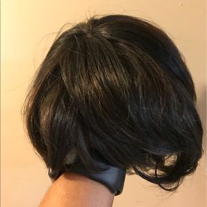 Short wig with auburn tint streaks