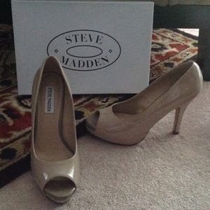 Faux patent leather peep toe heels.