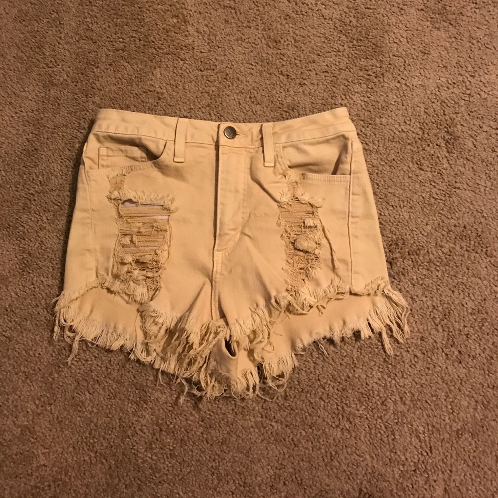Urban Outfitters distressed high waist tan shorts