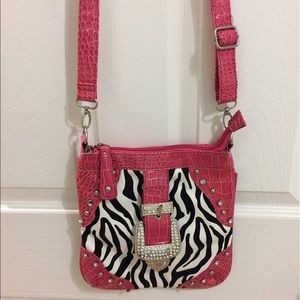 Cute zebra striped cross body with pink.