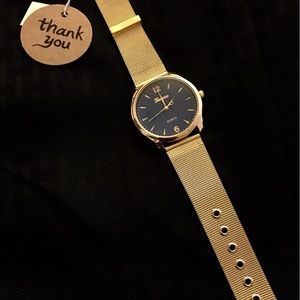 Gold men's Geneva watch