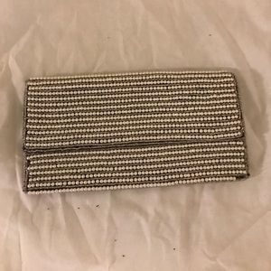 Faux pearl clutch